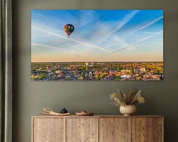 Hot air balloon above Hilversum by Dennis Kuzee