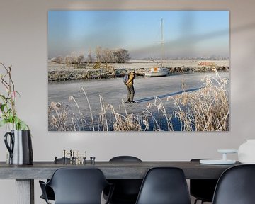 Winterlandschap met schaatser van Merijn van der Vliet