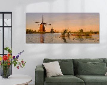 Kinderdijk molens bij avondlicht-panorama van Leo Huijzer