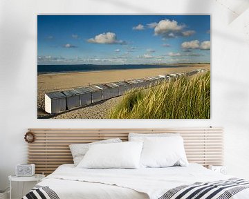 Cabanes de plage sur la plage près de Vrouwenpolder sur René Weijers