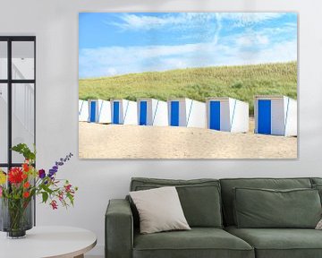 Beach houses on the beach in front of sand dunes by Sjoerd van der Wal Photography