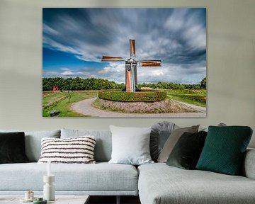 Windmühle in Wolkenlandschaft von Fotografiecor .nl