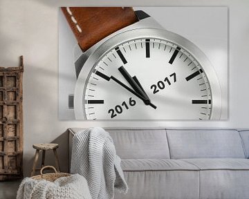 Horloge met analoge conceptuele visualisatie van de jaarwisselin van Tonko Oosterink