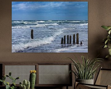 Groynes on shore of the Baltic Sea on a stormy day van Rico Ködder