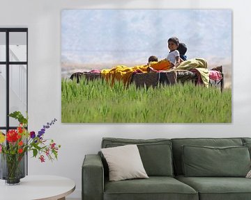 Children on a bed for their afternoon nap by Cora Unk