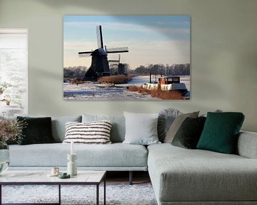 Hollandse oude windmolens in wintertafreel 