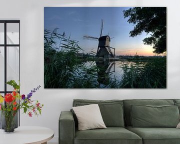 Traditional wind mill at Kinderdijk by Esther Seijmonsbergen