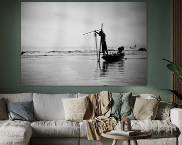 Silhouette of a fisherman with his fishing net on Lake India in Myanmar by Francisca Snel