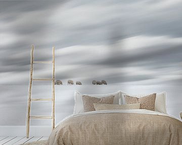 Sheep in a Dutch winter landscape by eric van der eijk