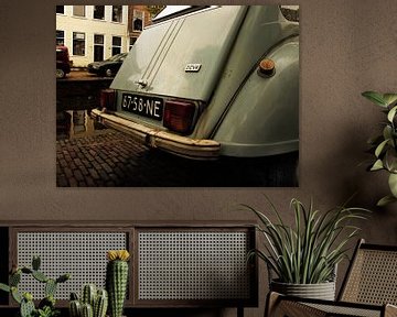 Backside of an old Citroen 2cv along one of the canals of Delft by Jan-Loek Siskens