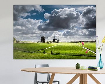 Dutch windmills and cloudy sky by Ricardo Bouman