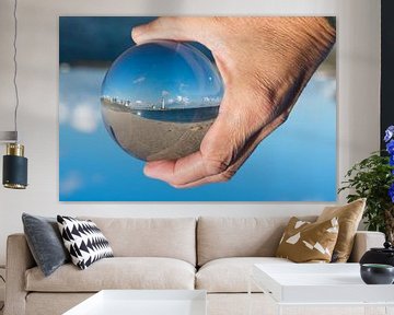 lighthouse in glass sphere