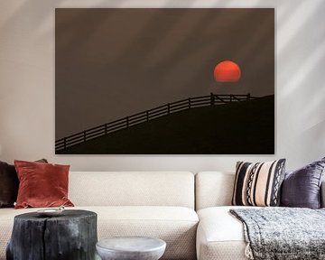 Sunset at the Wadden Sea dike of the Frisian Wadden coast