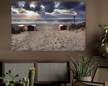 Ondergaande zon strandhuisjes Texel von Ronald Timmer