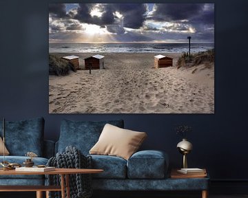 Ondergaande zon strandhuisjes Texel van Ronald Timmer