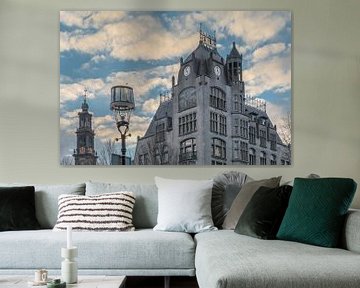 Jugendstil gebouw Astoria in Amsterdam lijkt op te gaan in wolken sur Suzan Baars