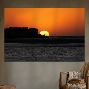 visserman bij zonsondergang