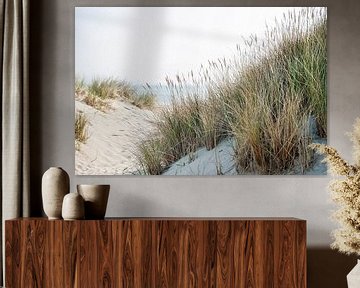 Dune with helm grass and sea view by Anouschka Hendriks