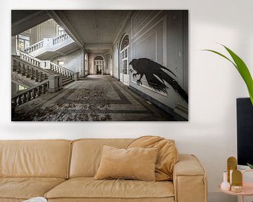 Staircase in big building, with bird art on the wall by Inge van den Brande