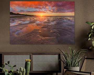 Sunset on beach at low tide by Rob Kints
