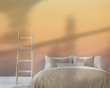 Sailboat on the coast of Ilha Grande in Brazil during sunset by Nick Chesnaye