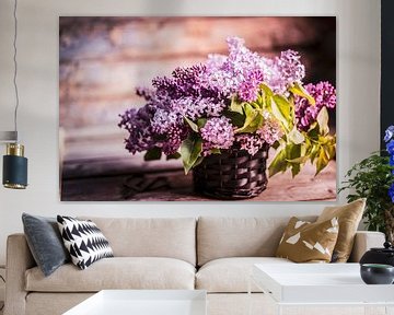 Bouquet of lilacs against wooden background by BeeldigBeeld Food & Lifestyle