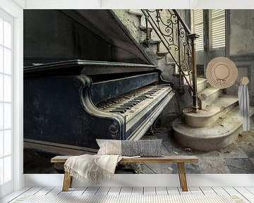 Piano next to the Staircase