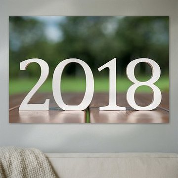 Cijfers tweeduizendachttien op een houten tafel