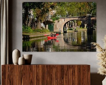 Canoeing on the Oudegracht in Utrecht near the Geertebrug bridge