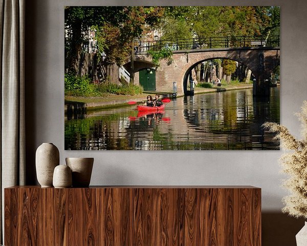 Canoeing on the Oudegracht in Utrecht near the Geertebrug bridge