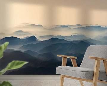 morning sun over misty mountains by Gerard Wielenga