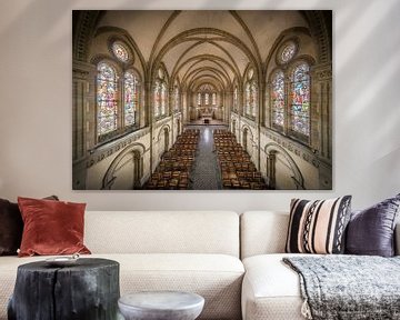 Church with stained glass windows by Inge van den Brande