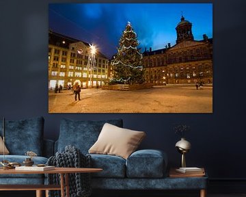 Kerstmis op de Dam in Amsterdam Nederland bij nacht van Eye on You