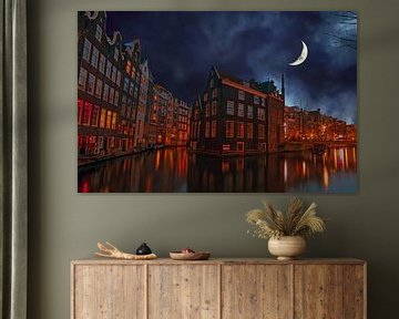 Stadsgezicht van Amsterdam Nederland bij halve maan