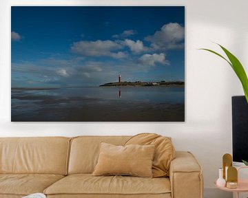 Texel lighthouse mirrors in the water