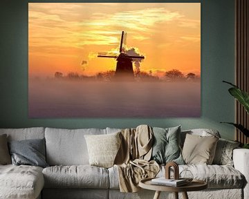 Traditionele hollandse molen in de winter bij zonsondergang van Eye on You