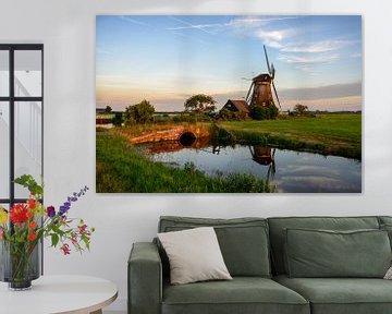 Windmill in the countryside in Holland by iPics Photography