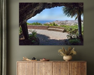 Cave outlook on sea and village on Madeira