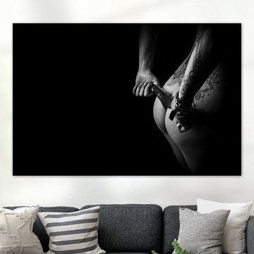 Naked woman with tattoos pulls off thong - sensual black and white art
