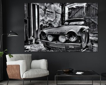 An abandoned Triumph car black and white edition Rawbird Photos by Wouter Putter