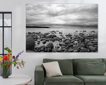 Rounded stones on the shore of Vancouver Island by Emile Kaihatu