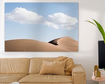 Nuages au-dessus d'une dune de sable dans le désert d'Iran.