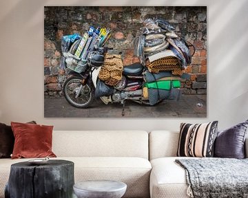 Fully packed scooter in Vietnam by Rietje Bulthuis