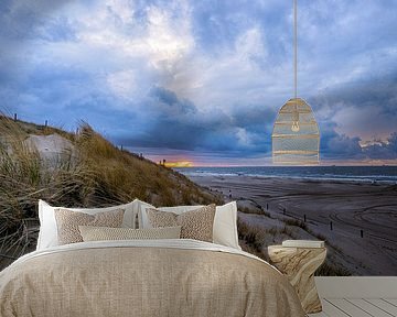 Zonsondergang met duin en zee