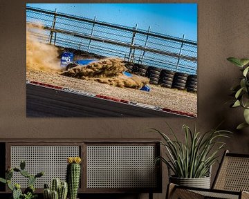 Formula Renault car dives into the gravel by autofotografie nederland