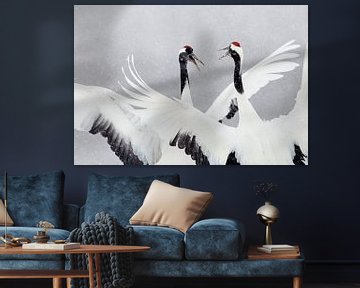 Dansende Chinese Kraanvogels in de sneeuw