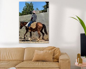 Cuban farmer on trotting horse, portrait