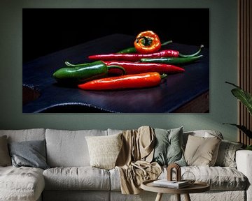 Peppers on a wooden cutting board