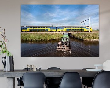 De trein in het Nederlandse landschap: Oostzaan van John Verbruggen