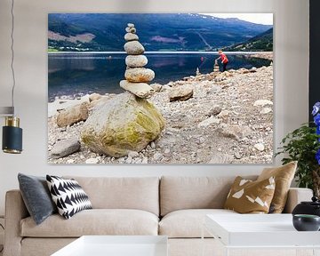 Stone man or cairn along the bank of the Vangsvatnet lake by Evert Jan Luchies